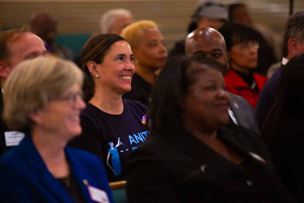  On the evening of Sunday, Nov. 4, Anita Earls sits in the pews of Union Baptist Church in Durham, N.C among fellow N.C. democratic candidates. The Durham Committee on the Affairs of Black People invited democratic candidates they endorsed to each sp