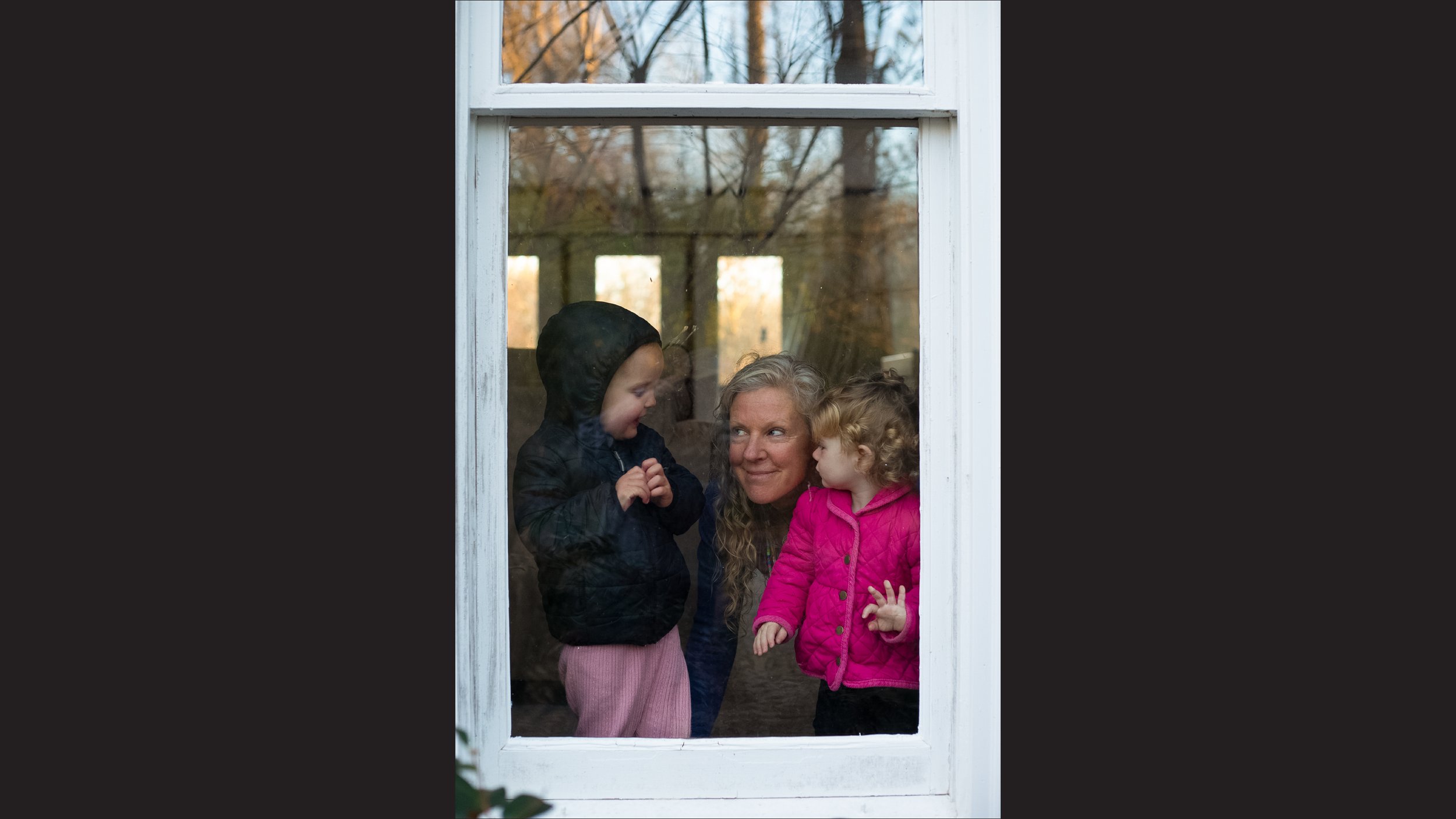  At the end of the day, Tobin waits with the kids from her child care at the front window as they wait for their parents to come pick them up.  Every time a child moves on from the child care, Tobin writes a letter to the family, who she works to dev