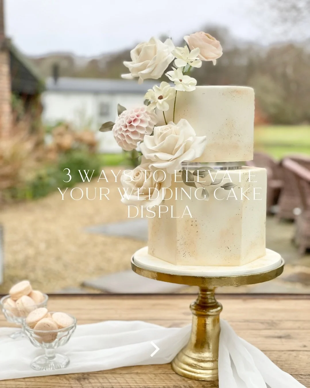 Choose a statement backdrop.
A beautiful backdrop instantly makes your cake feel intentional and styled.
Think: exposed brick, floral arches, mirrors, fireplaces, large windows with natural light.

Add florals around the base.
A few carefully placed 