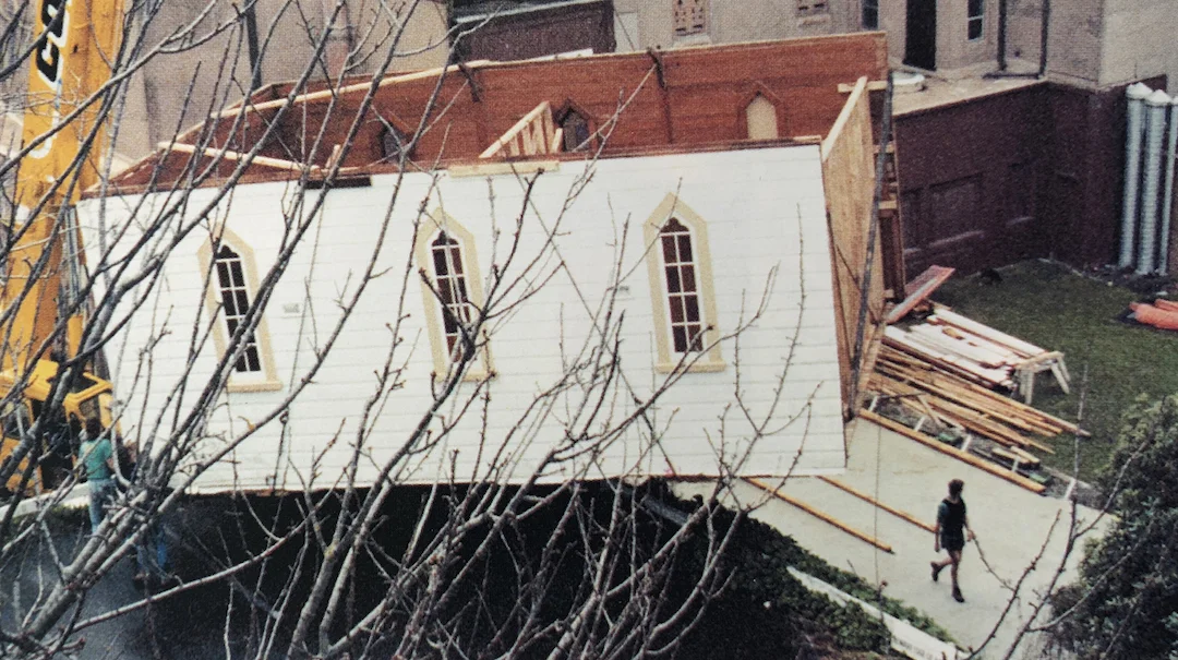 The chancel is lowered into place beside the cathedral