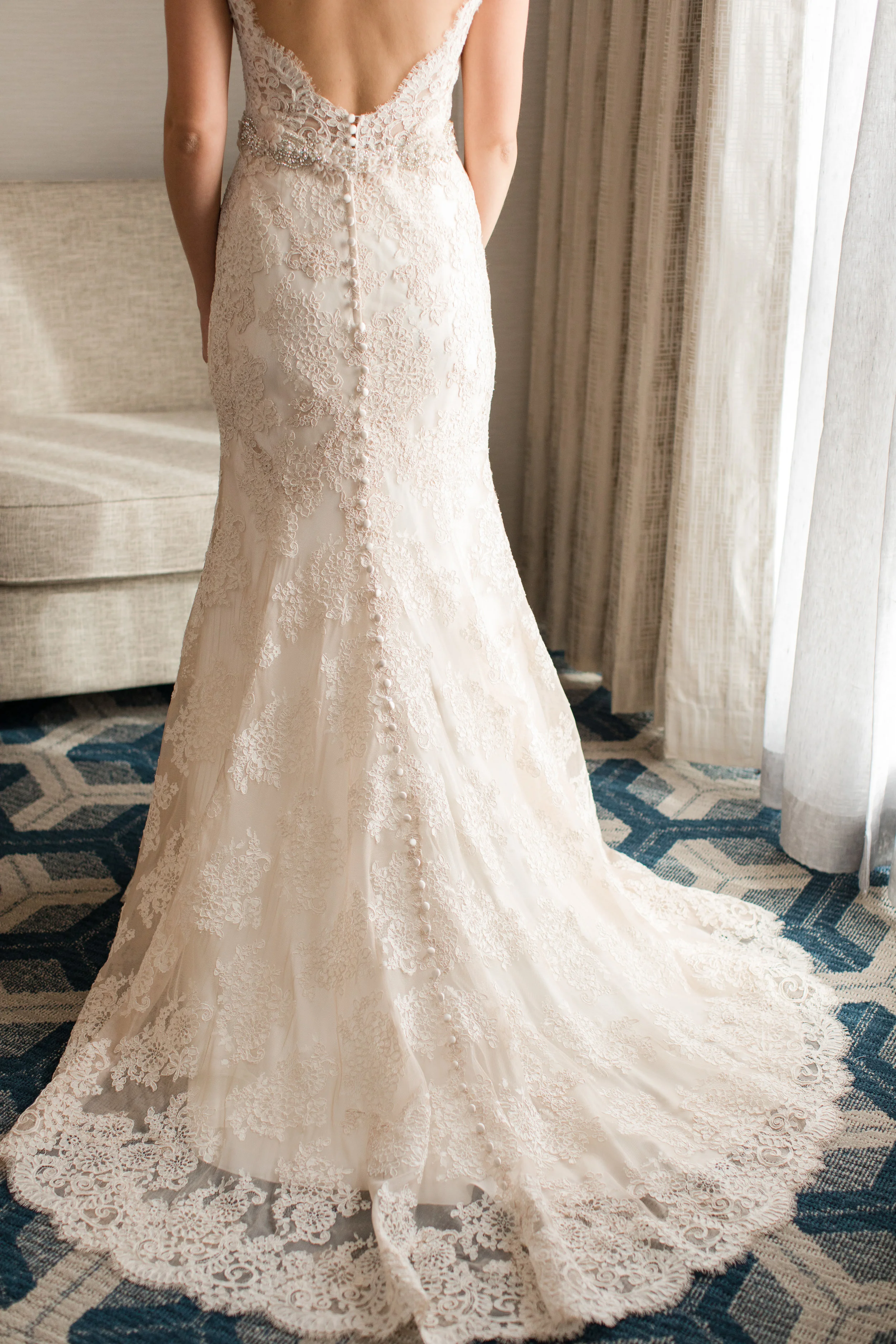 allure bridal lace wedding dress with low back and buttons at sheraton eatontown