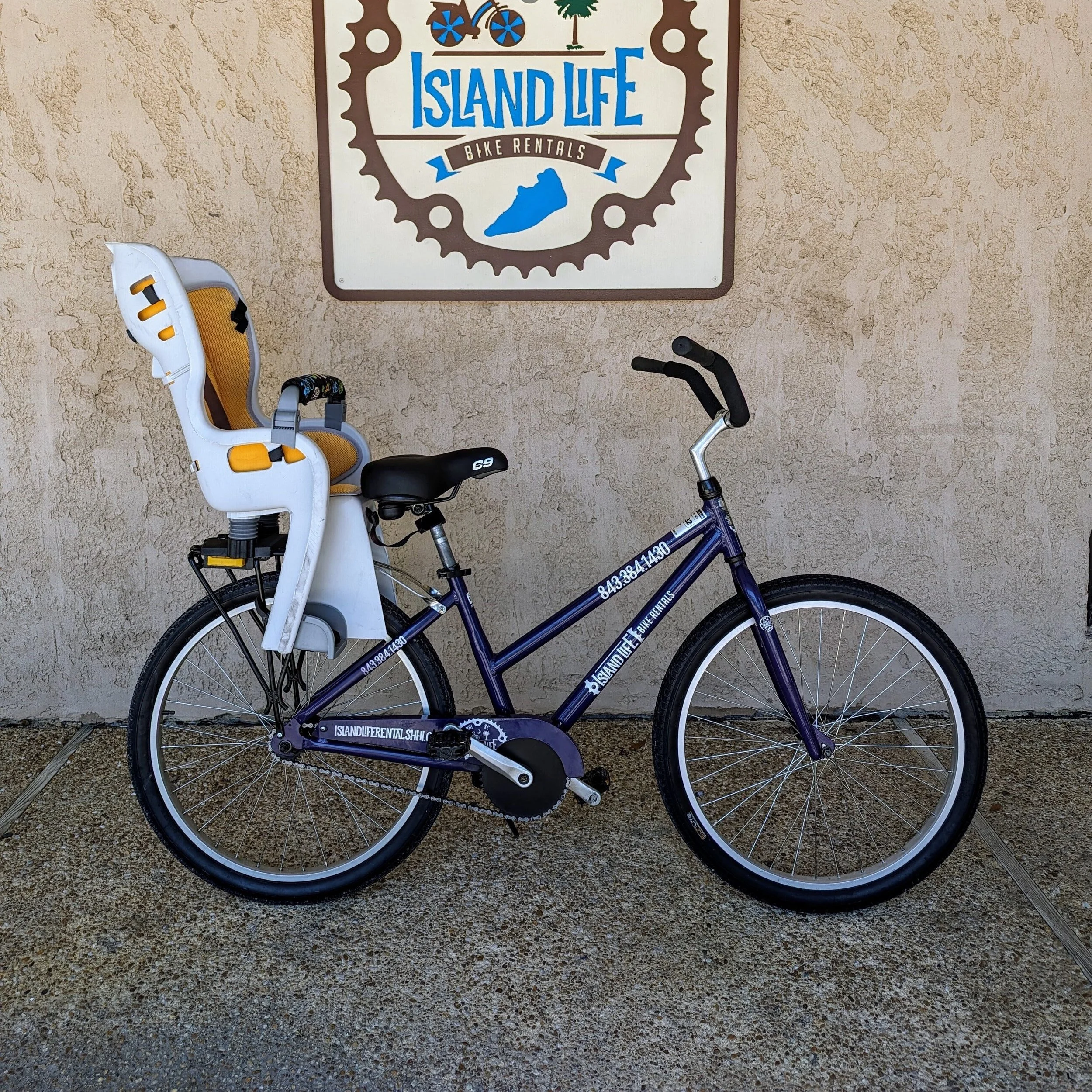 26" beach cruiser rental with child seat (up to 35 lbs), perfect for cruising Hilton Head with a little one safely along.