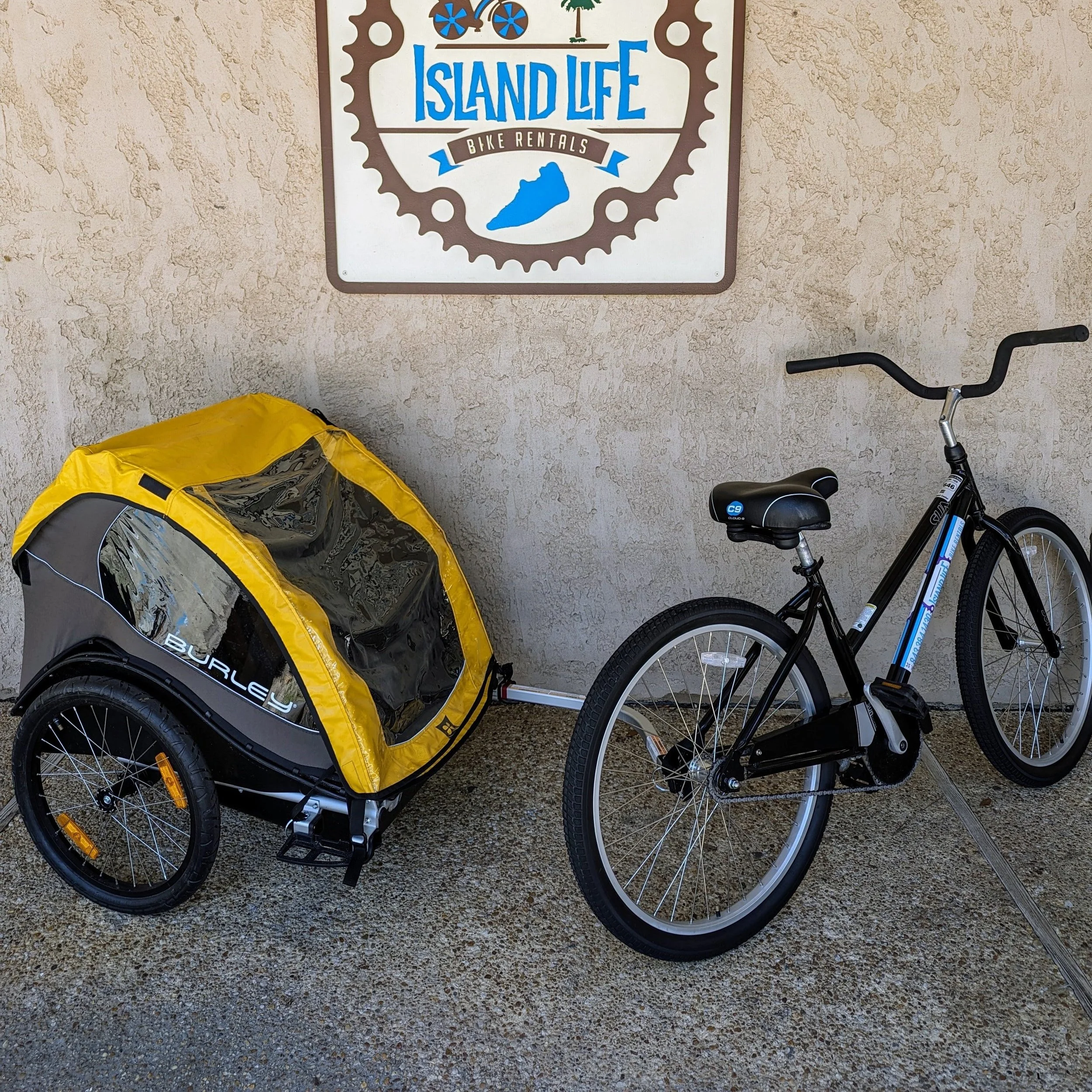 26" beach cruiser rental with kid cart attachment (up to 100 lbs), perfect for riders exploring Hilton Head with a little one.