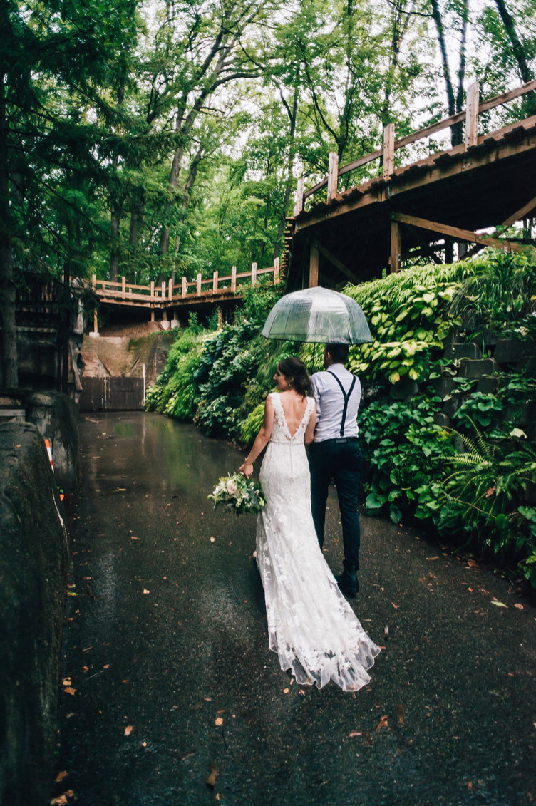 A last minute modification meant the train was protected by a custom liner for this rainy day wedding