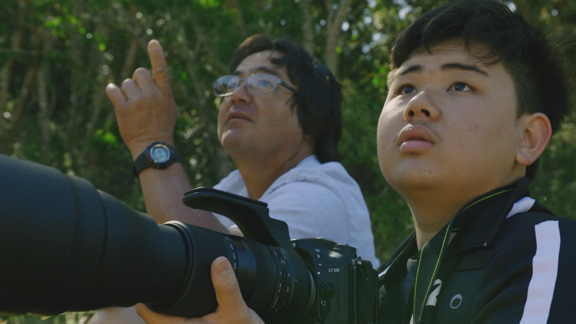 Jared_with his father birding.jpg