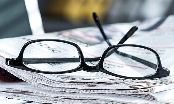 Glasses and Newspaper.png