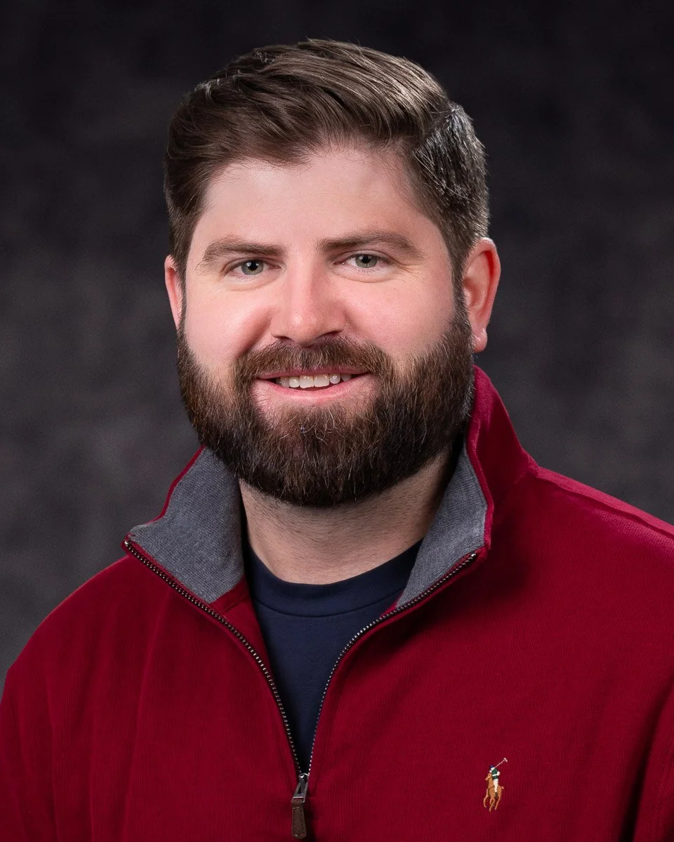 Hinsberger_Dan_Grey_Wide_Headshot_LR.jpg