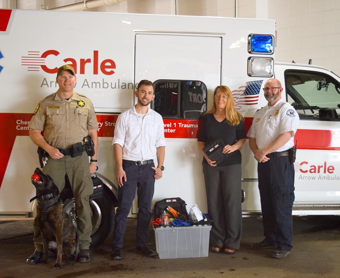 5/2/18 - Sgt. Lillard and K9 Yadi, Illinois State Police (left), Paul Fedyniak DVM (middle left), Maureen McMichael, DVM (center right), Jim Zinders, operations manager of Arrow Ambulance - Carle Hospital (right). 