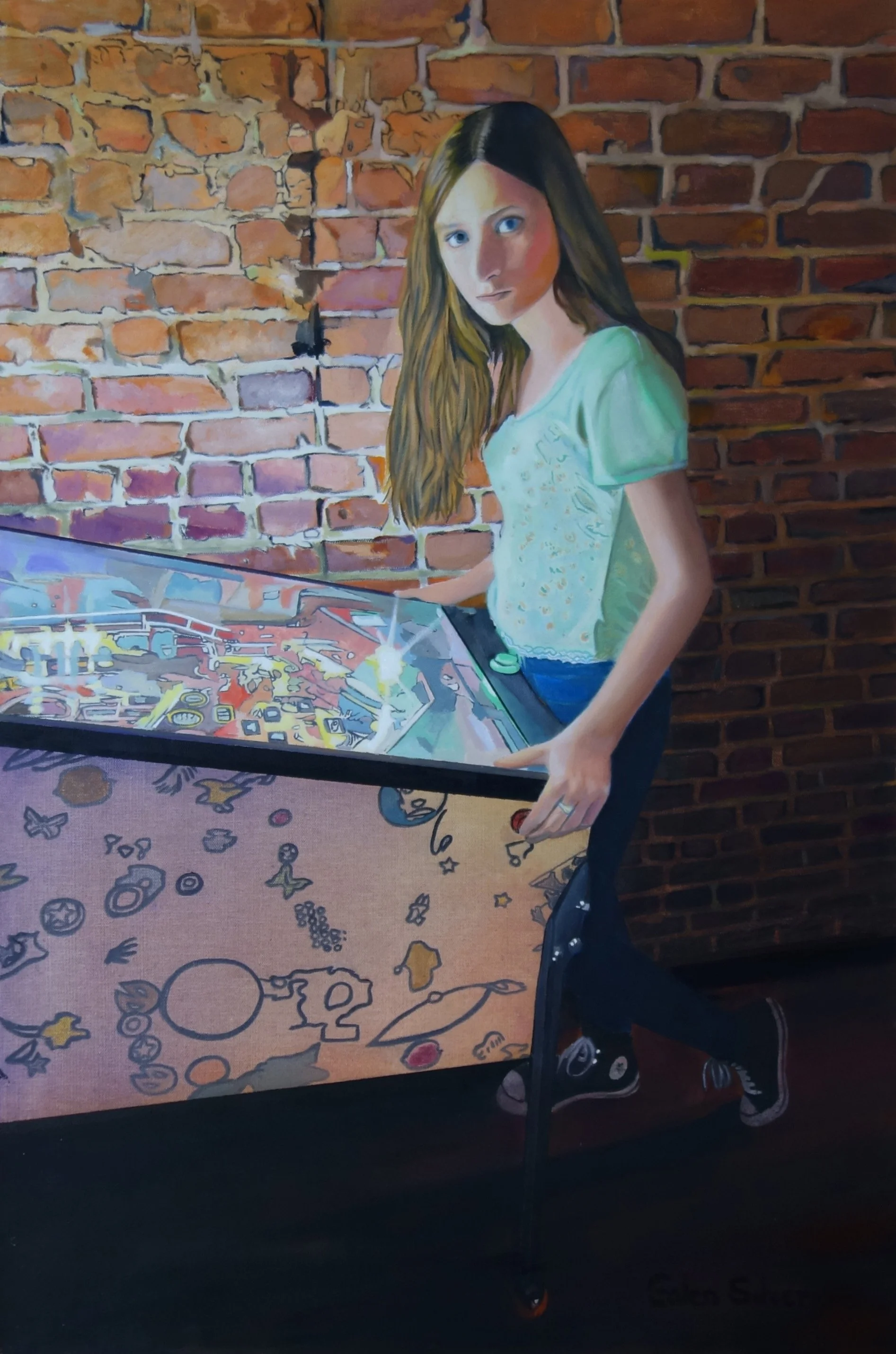 Girl Playing Pinball