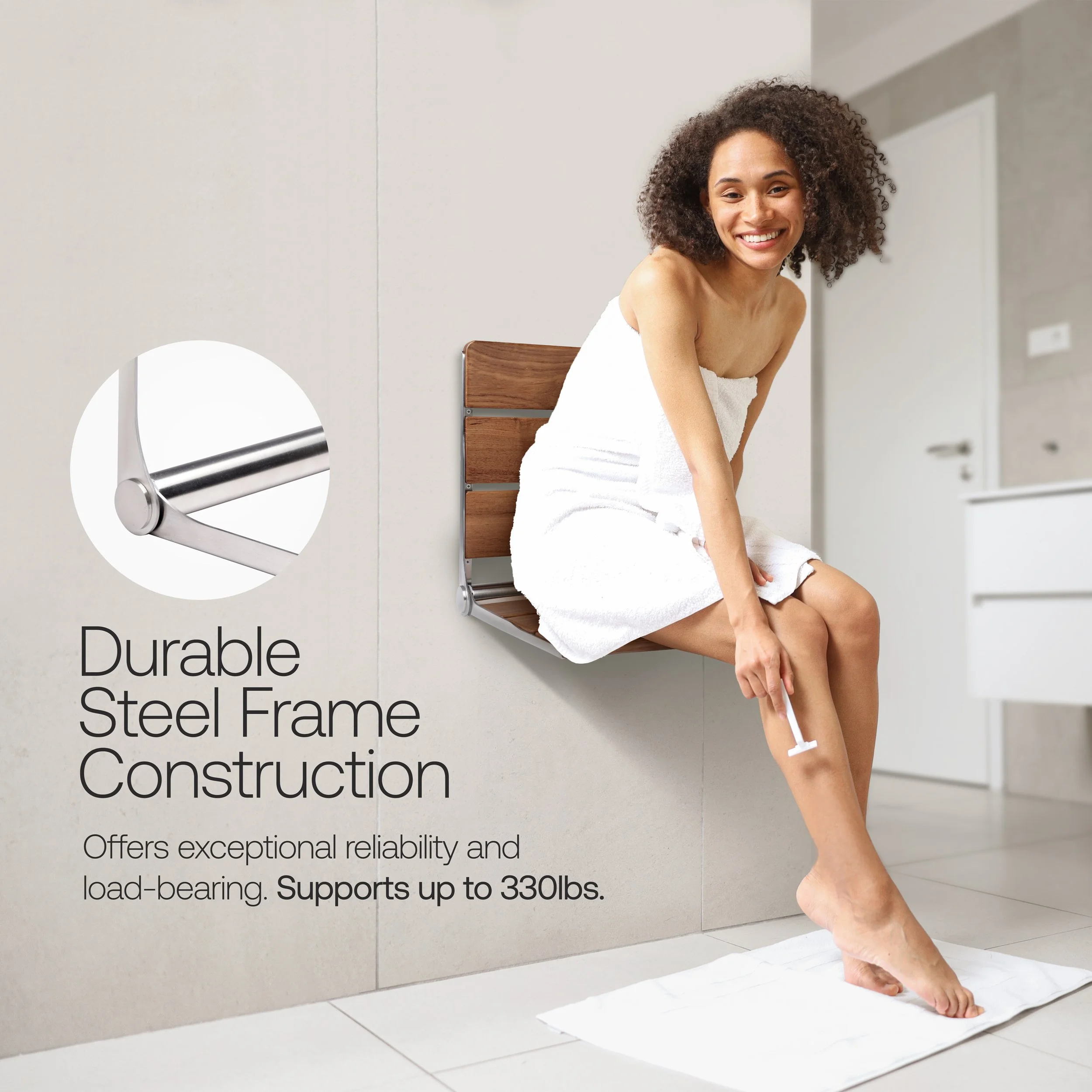 Woman seated on a wall-mounted teak shower bench with durable steel frame construction highlighted.