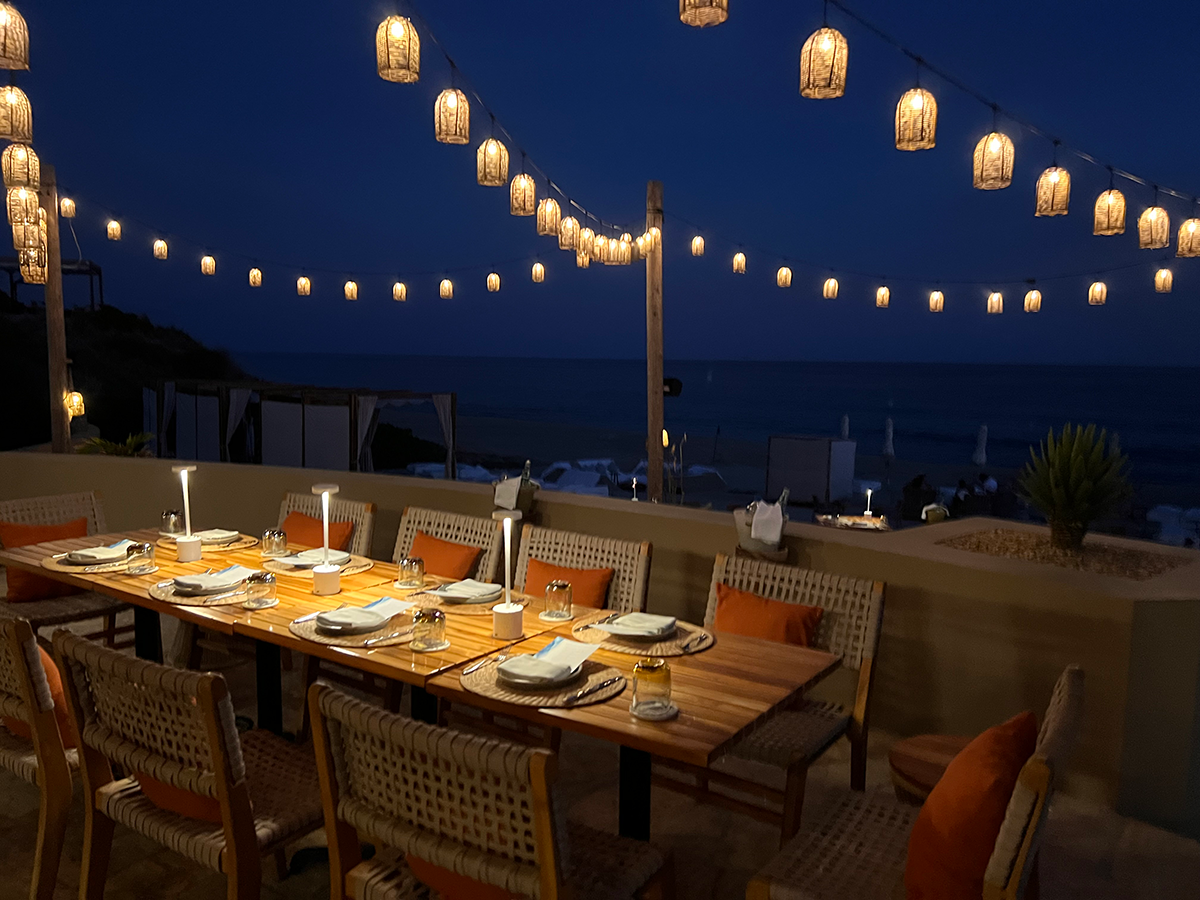 Dining setting at Equis at night.