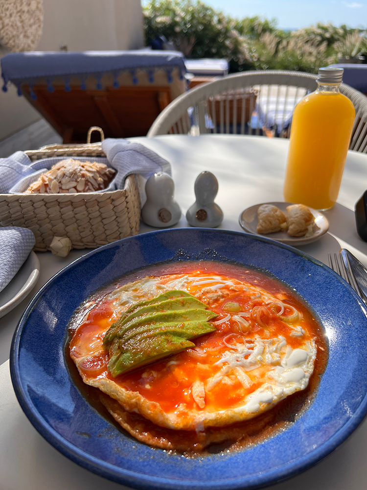 Breakfast on my terrace at Sensei at Zadún, a Ritz-Carlton Reserve: Huevos Rancheros, fresh squeezed orange juice, and an almond croissant.