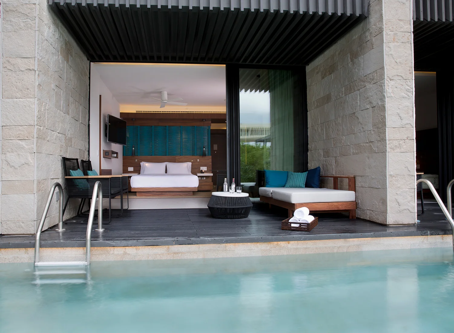 Relaxation area by the pool at Cenote Spa.