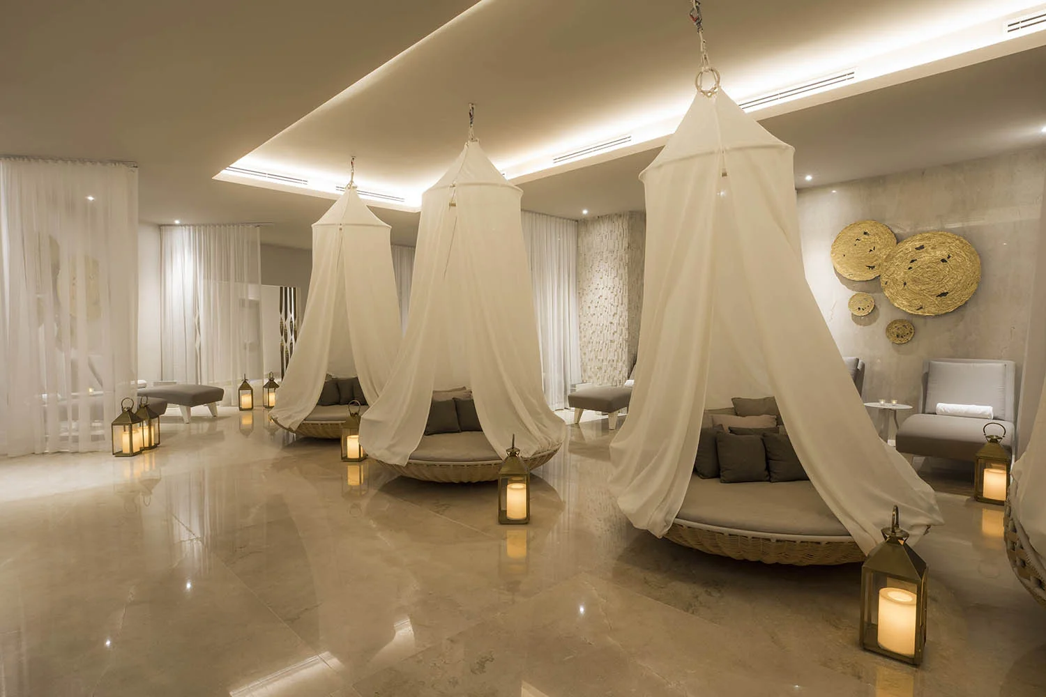 Stylish lounging beds in the spa's waiting area.