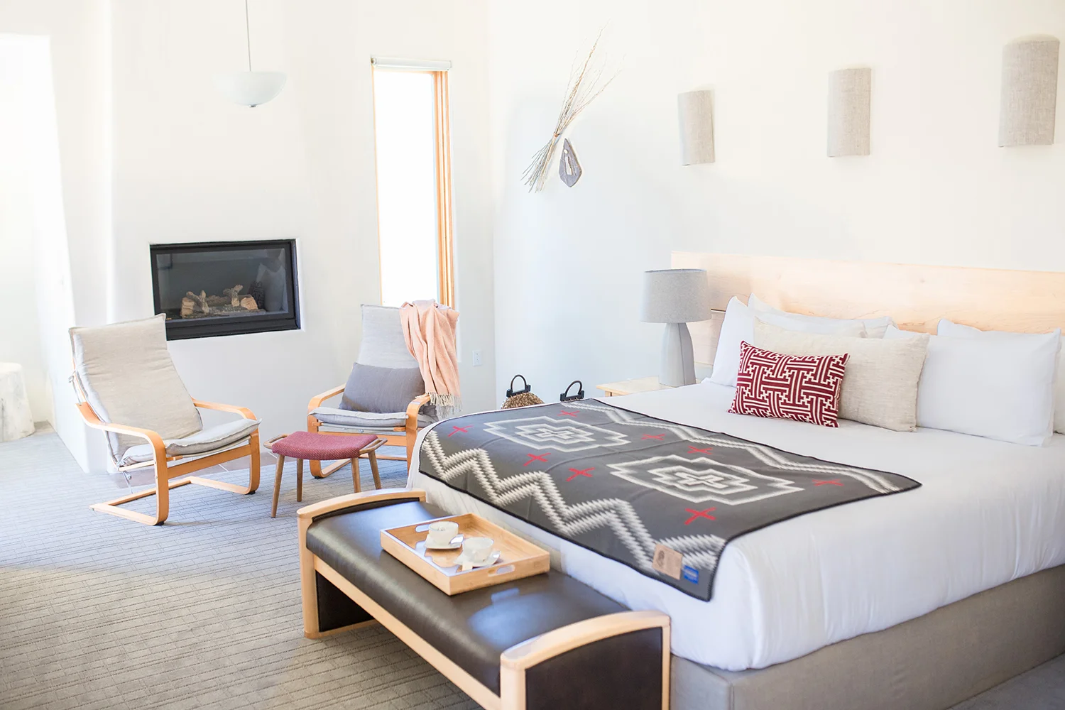 The enchanting accommodations features local artisan touches and a gas fireplace.