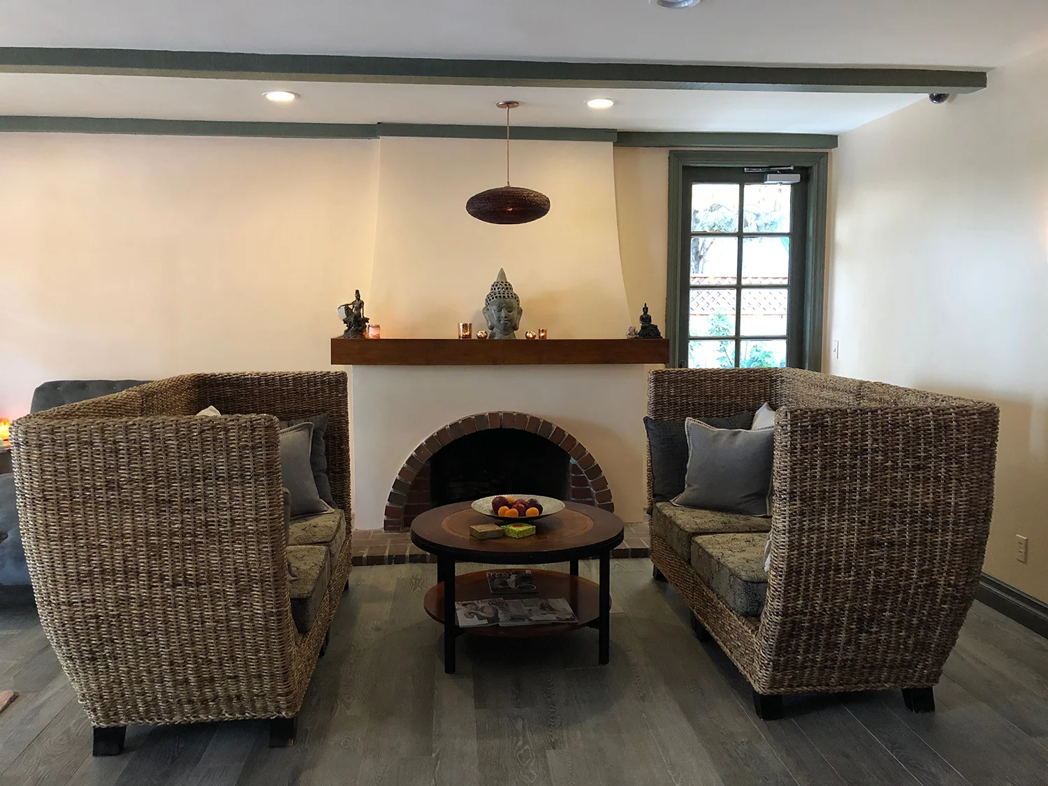 The stylish co-ed relaxation lounge includes a cozy fireplace.