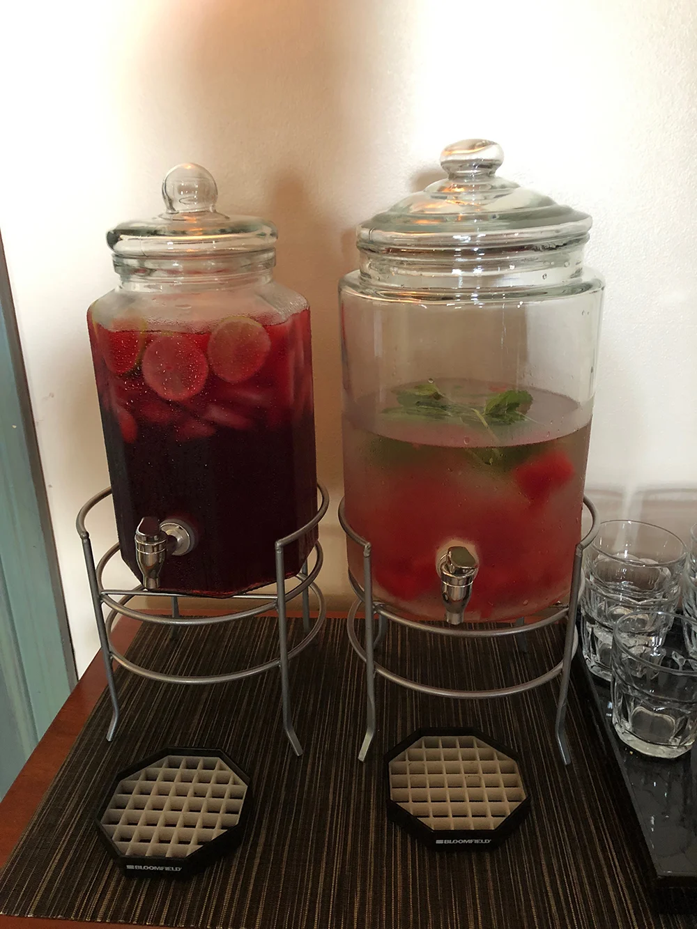 Drinks offered include pomegranate tea and watermelon-infused water.