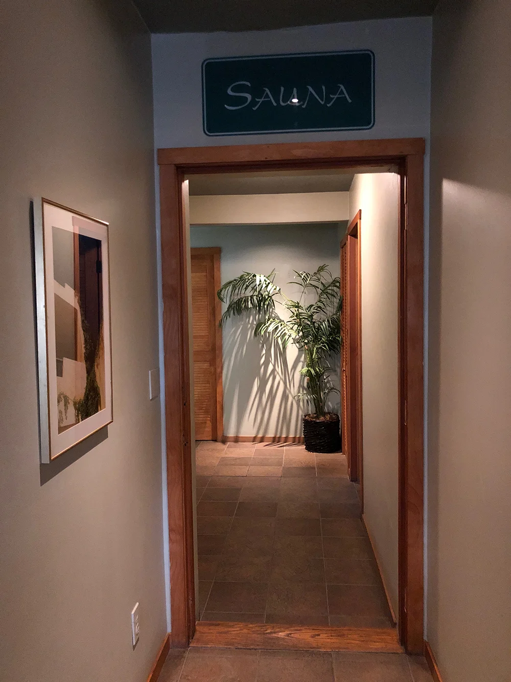 The hallway leading to the dry sauna and treatment rooms.