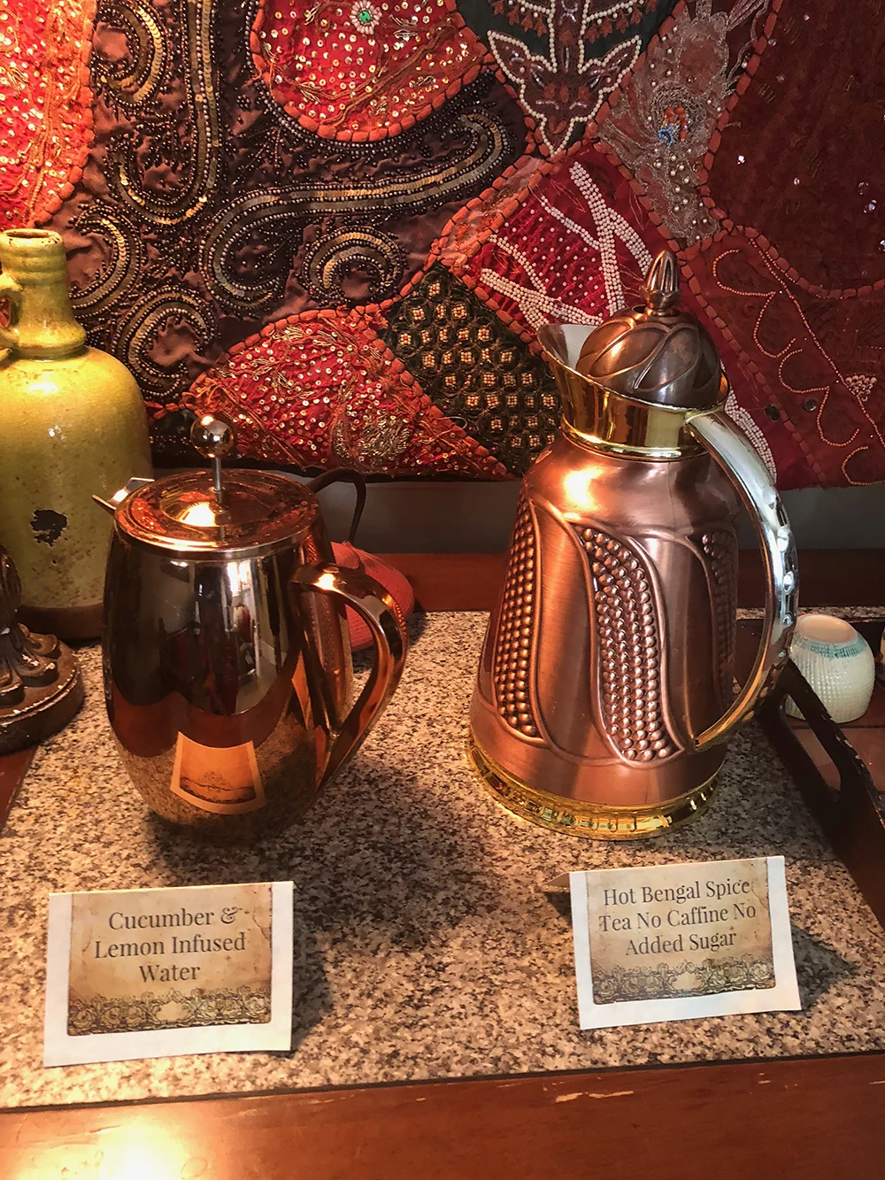 Guests are offered a choice of refreshing cucumber and lemon-infused water or hot Bengal spice tea.