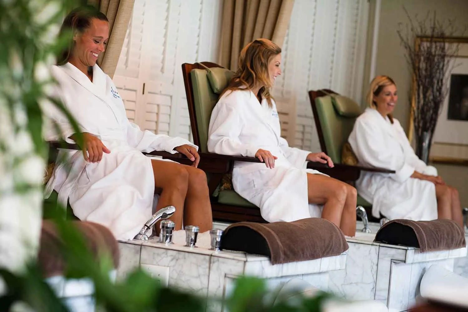 Guests enjoy treatments at Kohler Waters Spa.