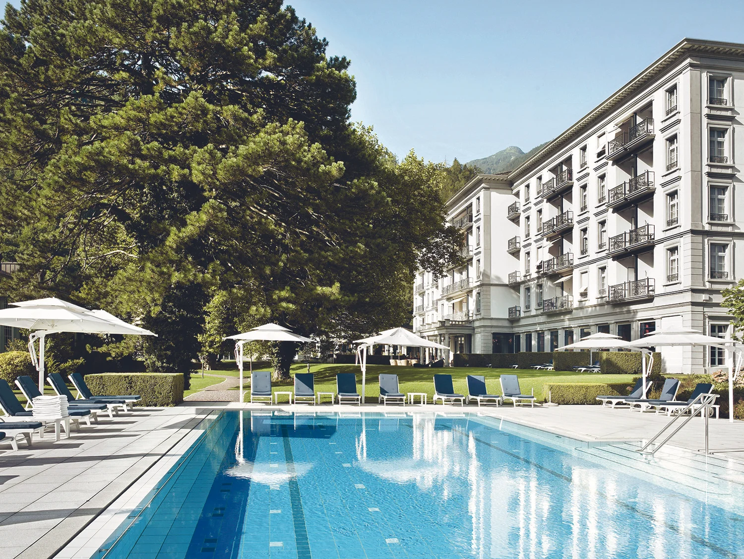Guests also enjoy lounging by the garden swimming pool outdoors.