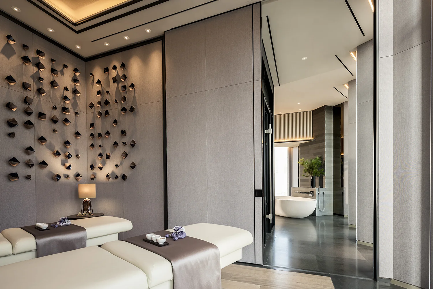 The couples’ spa suite includes a large bathtub, steam room, dressing room, powder room and spacious relaxation area.