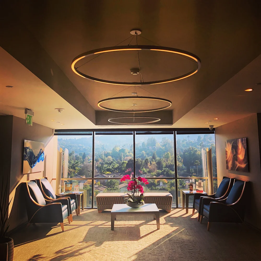 The waiting area offers prime views of the Encino hills.