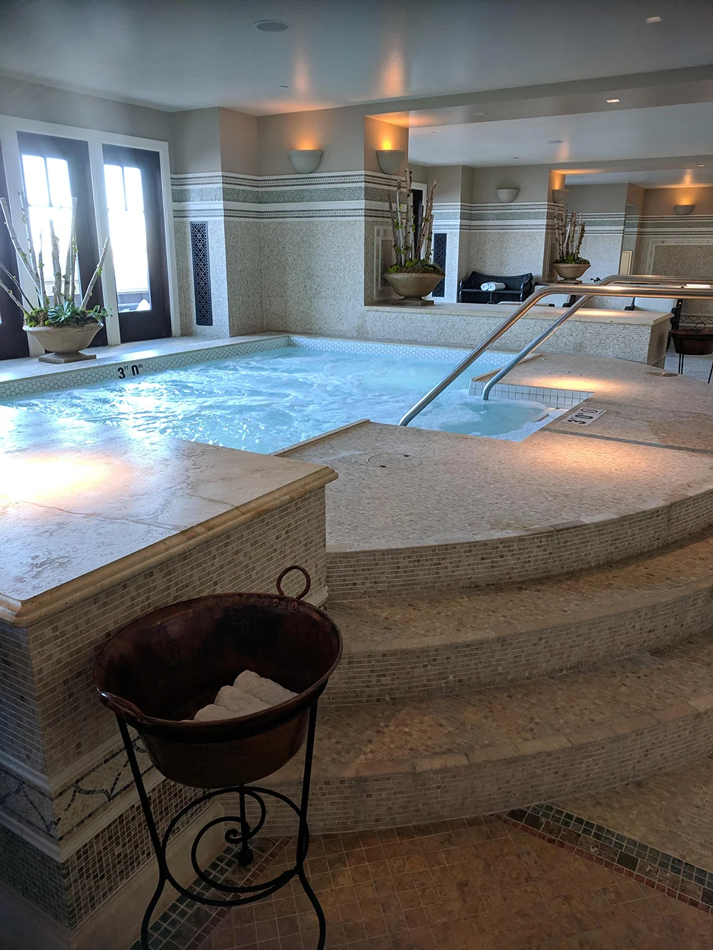 The whirlpool also features a stunning mosaic design.