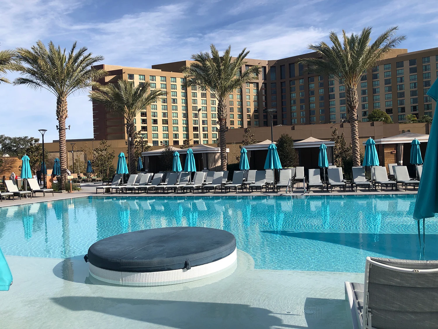 The zero-edge Main Pool with a swim-up bar at The Cove.