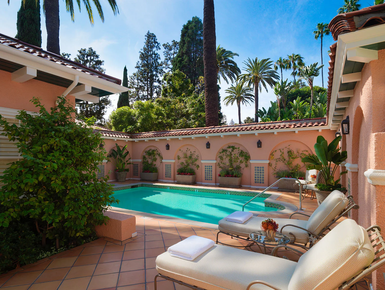 The bungalow includes a private outdoor pool, Jacuzzi, and large patio with outdoor seating.