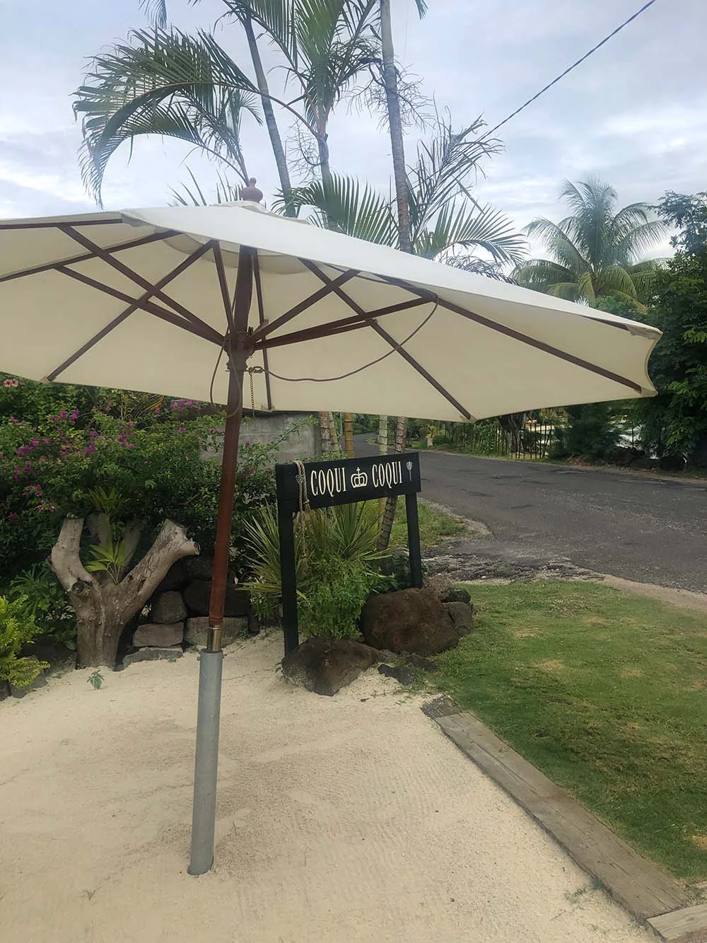 The store is located on the main beach road of Matira Beach.