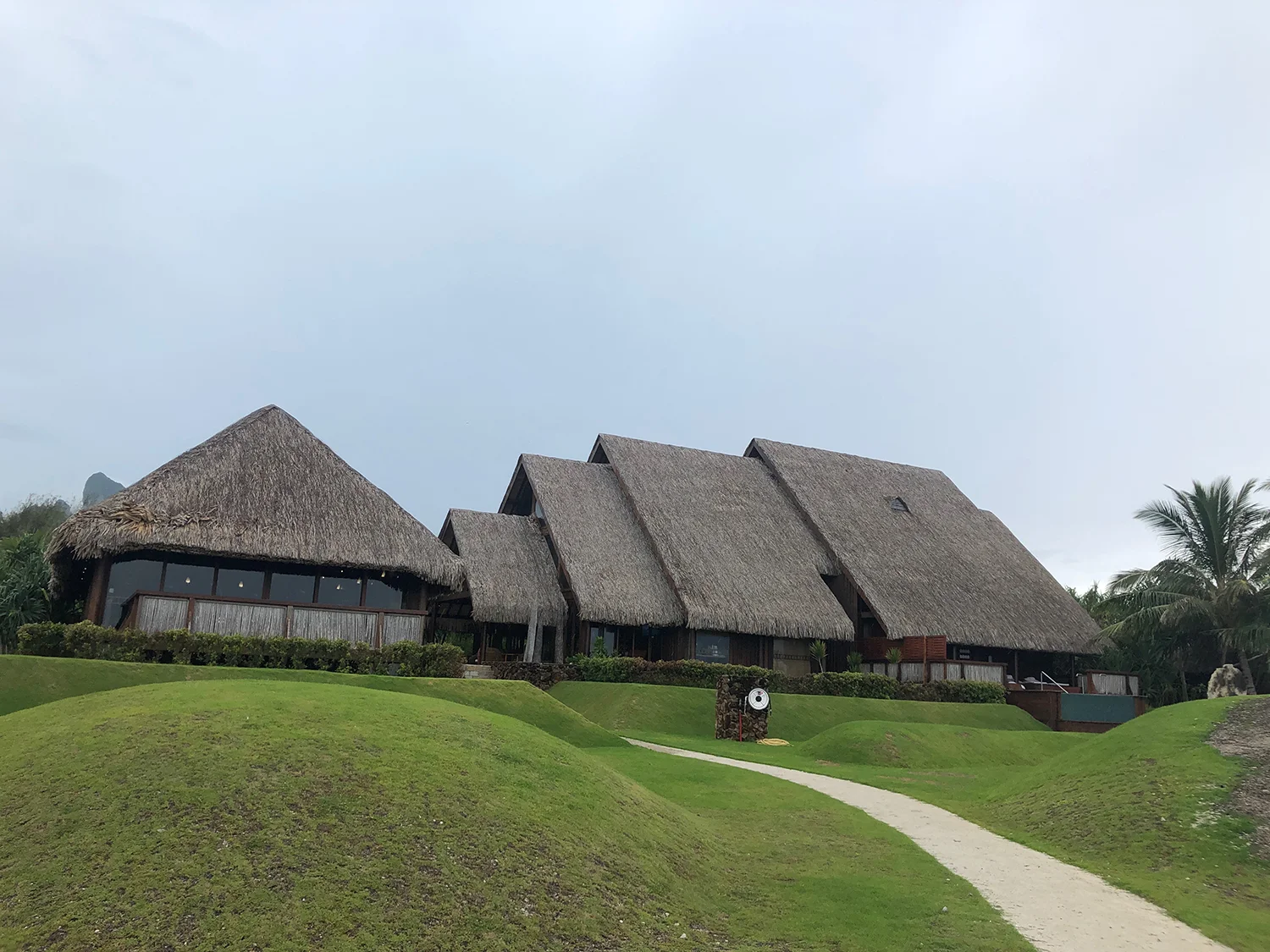Te Mahana Spa overlooks tropical groves and the Pacific Ocean.