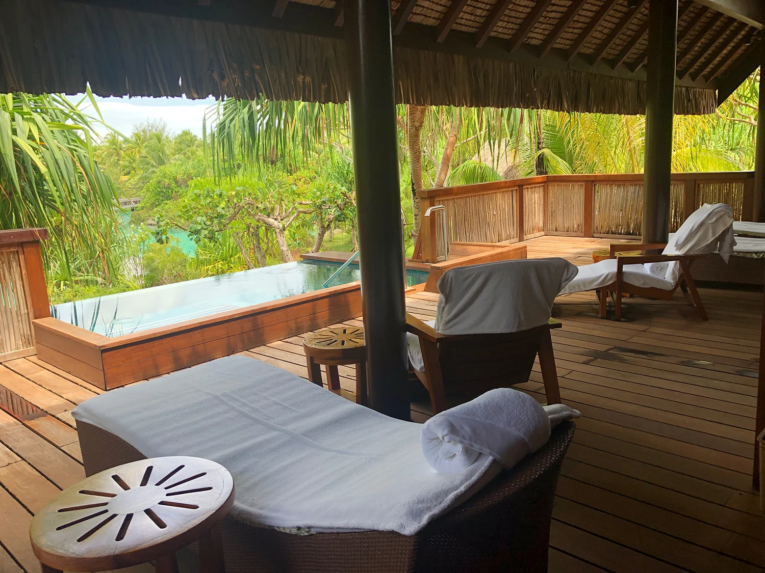 The relaxing outdoor lounge area next to the infinity pool.