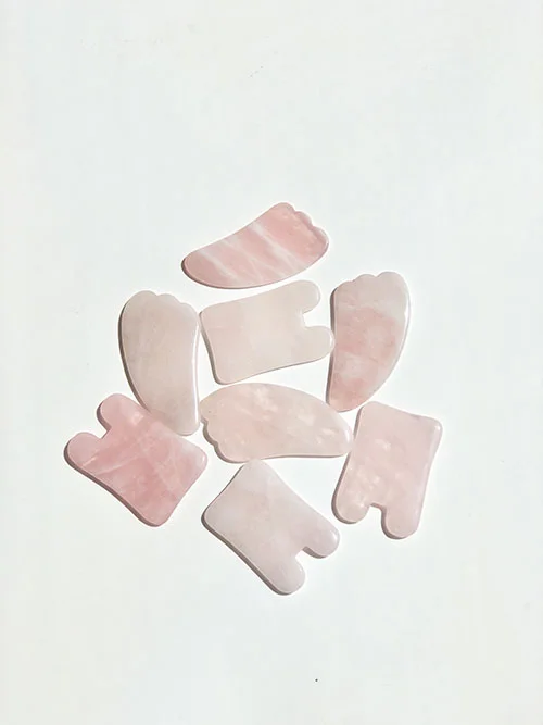 Herbivore Gua Sha Tools in Rose Quartz.