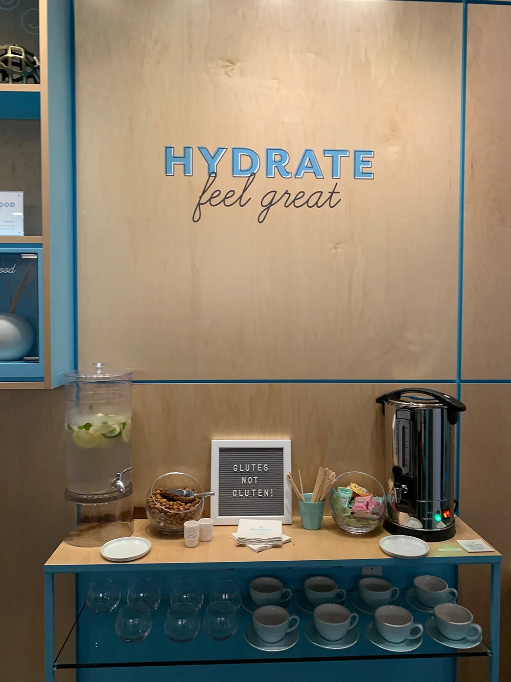 The snack station includes tea, infused water and almonds.