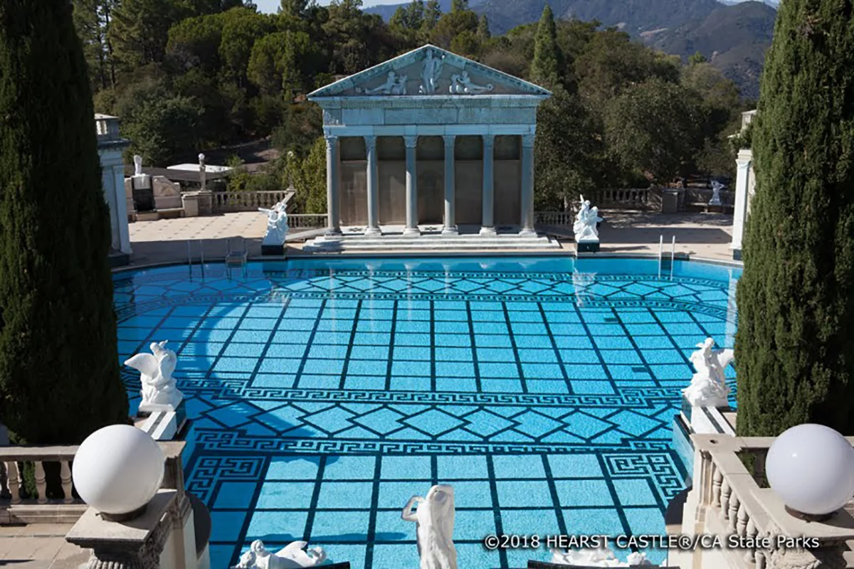 Other notable aspects of the Neptune Pool include the oil-burning heating system, the Vermont marble that lines the basin, gutters, and alcove, and four Italian relief sculptures on the sides of the colonnades.