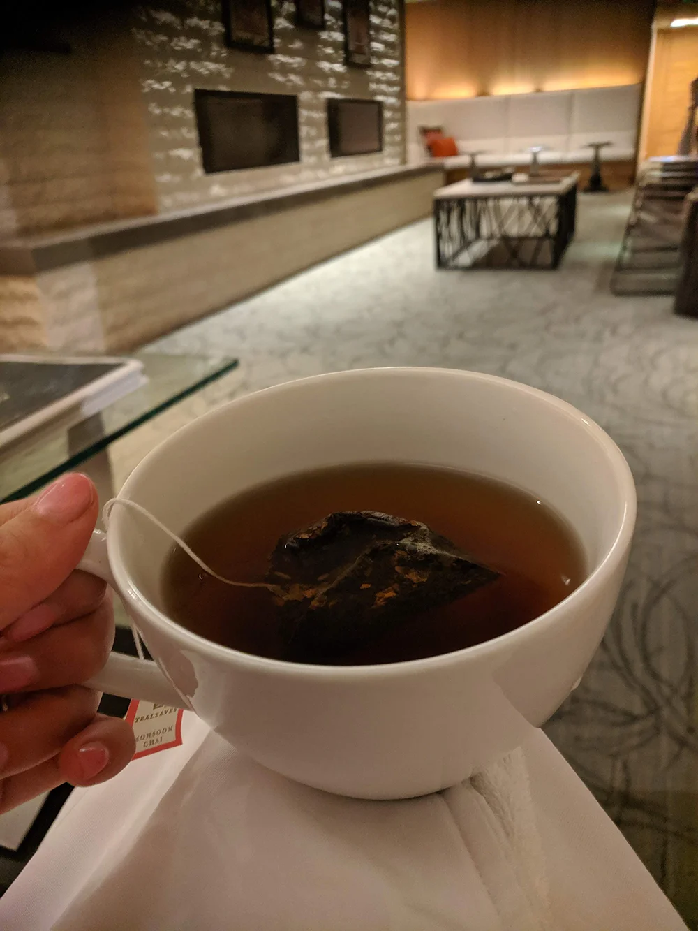 Sipping tea before my spa treatment.