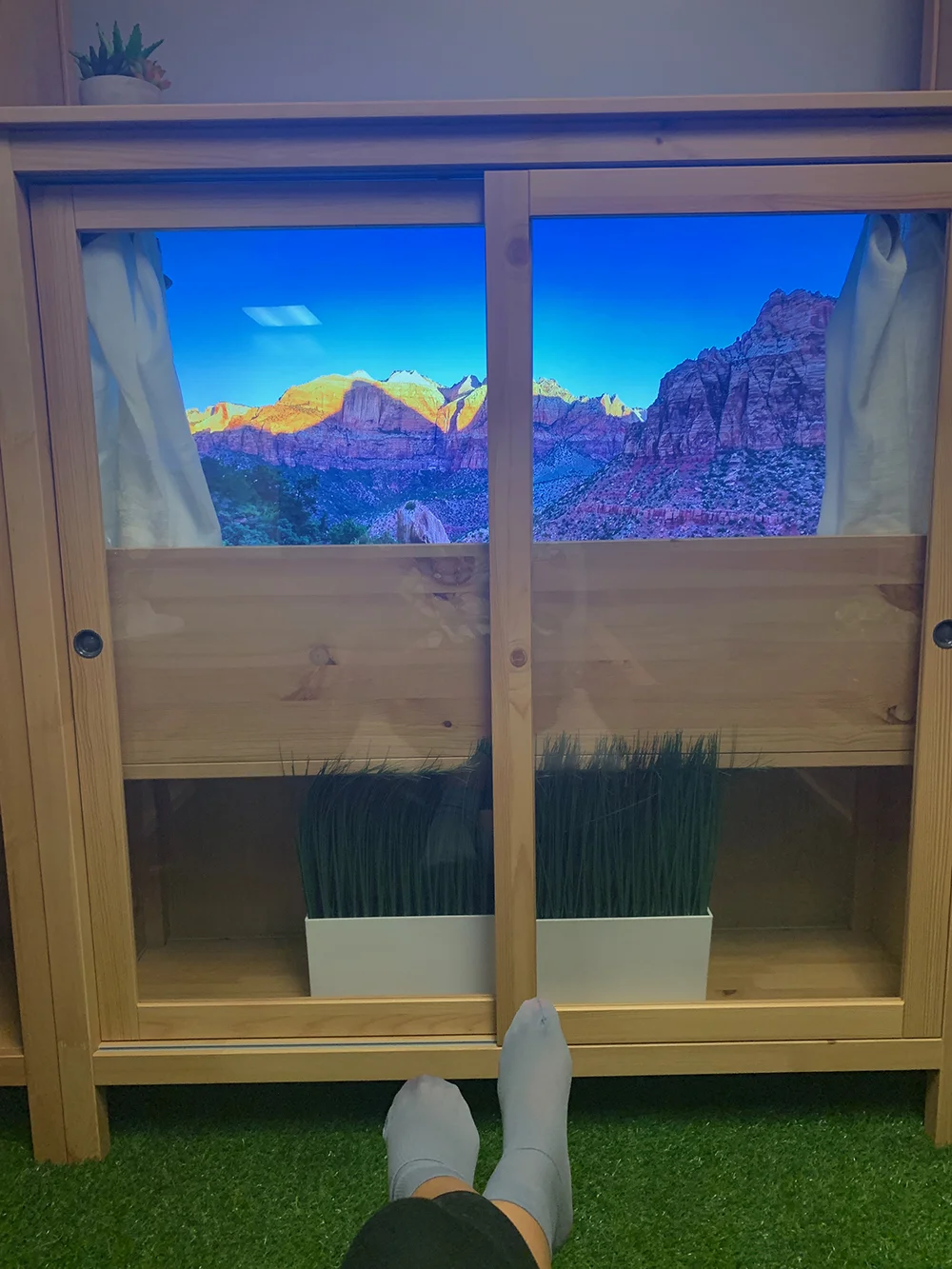 Relaxing in my socks while enjoying the changing backgrounds on the screen.