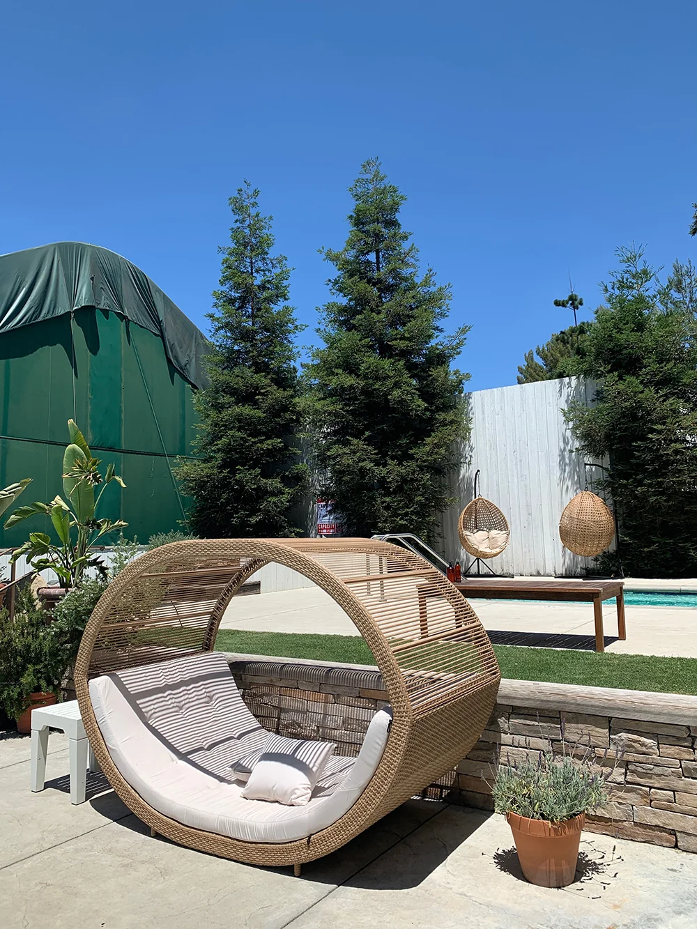 More outdoor seating for poolside lounging.