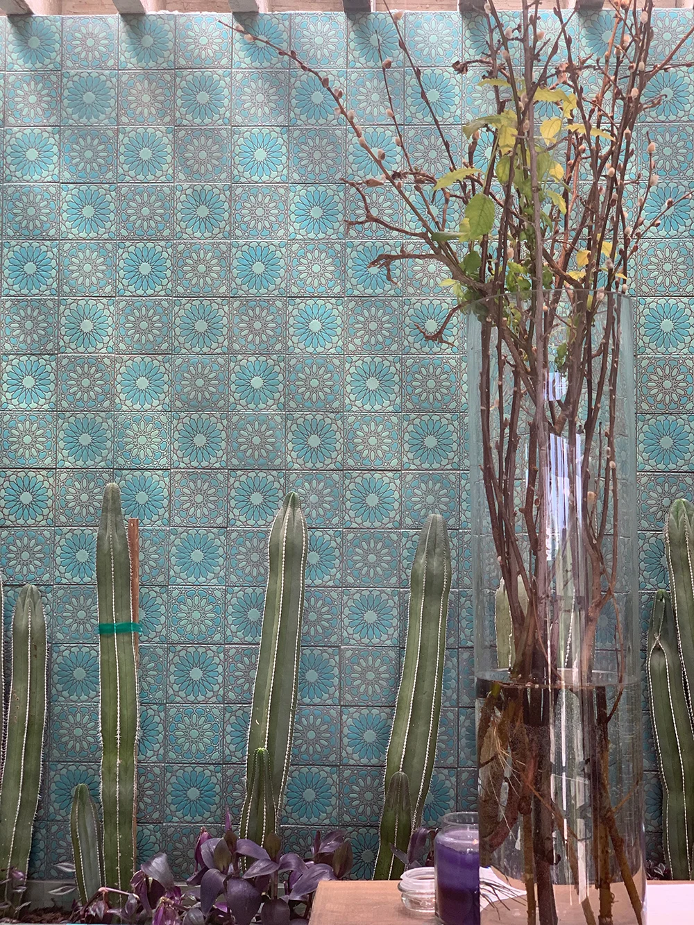 The beautiful tile wall behind the check-in desk.
