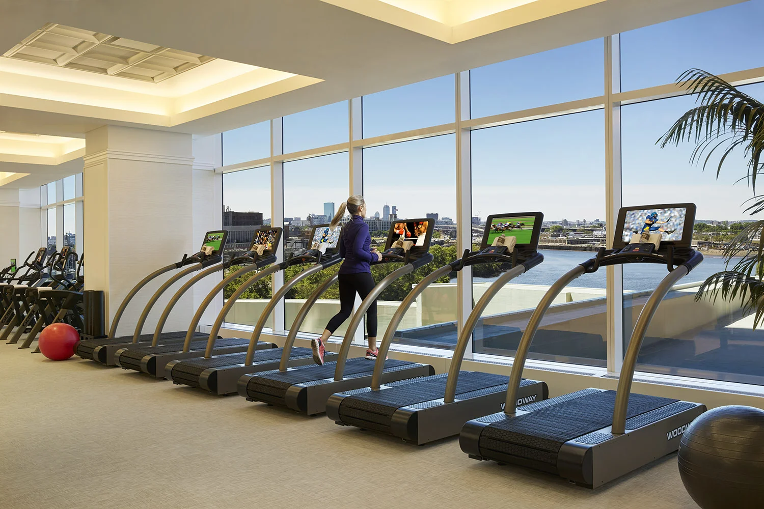 The fitness center offers stunning views.