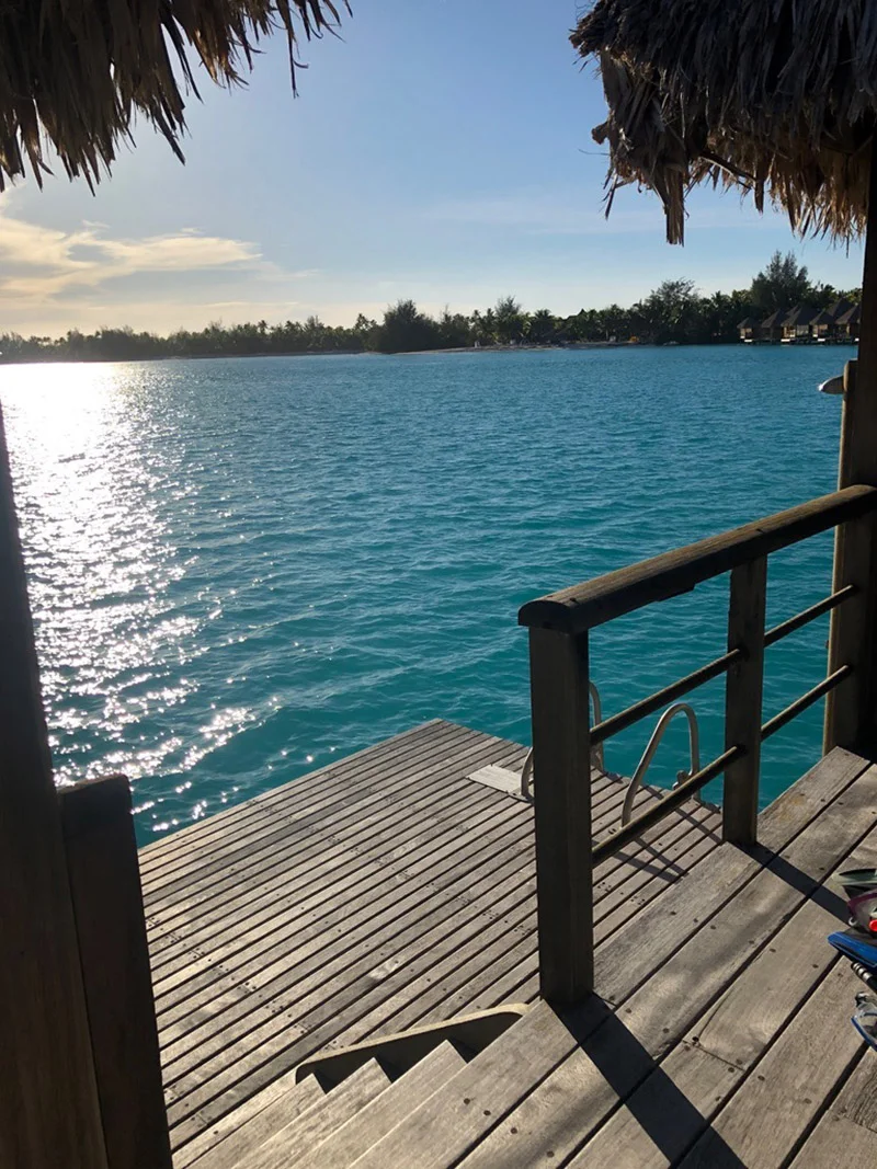 Our private deck with an outdoor shower and lagoon views with water access.
