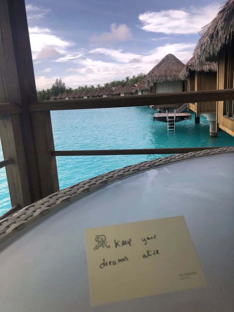 A thoughtful note left by a staff member along with room service.
