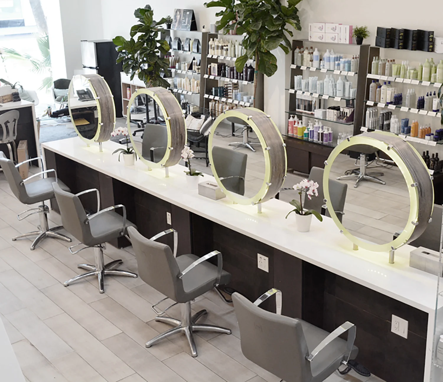 Downstairs there are 18 hair stations, while upstairs hosts an additional four hair stations, a nail station, a skincare service room, and a VIP service room.