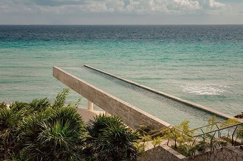 Discover the Most Beautiful Swimming Pools Around the World: A Pool Shaped Like Texas, Swimming on the Edge of a Skyscraper, and More