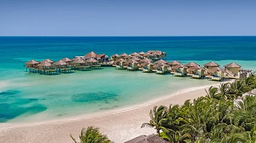 Palafitos Overwater Bungalows at El Dorado Maroma Resort Offer a Private Tropical Retreat in Riviera Maya, Mexico
