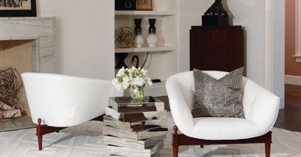 White chair with decorative pillow