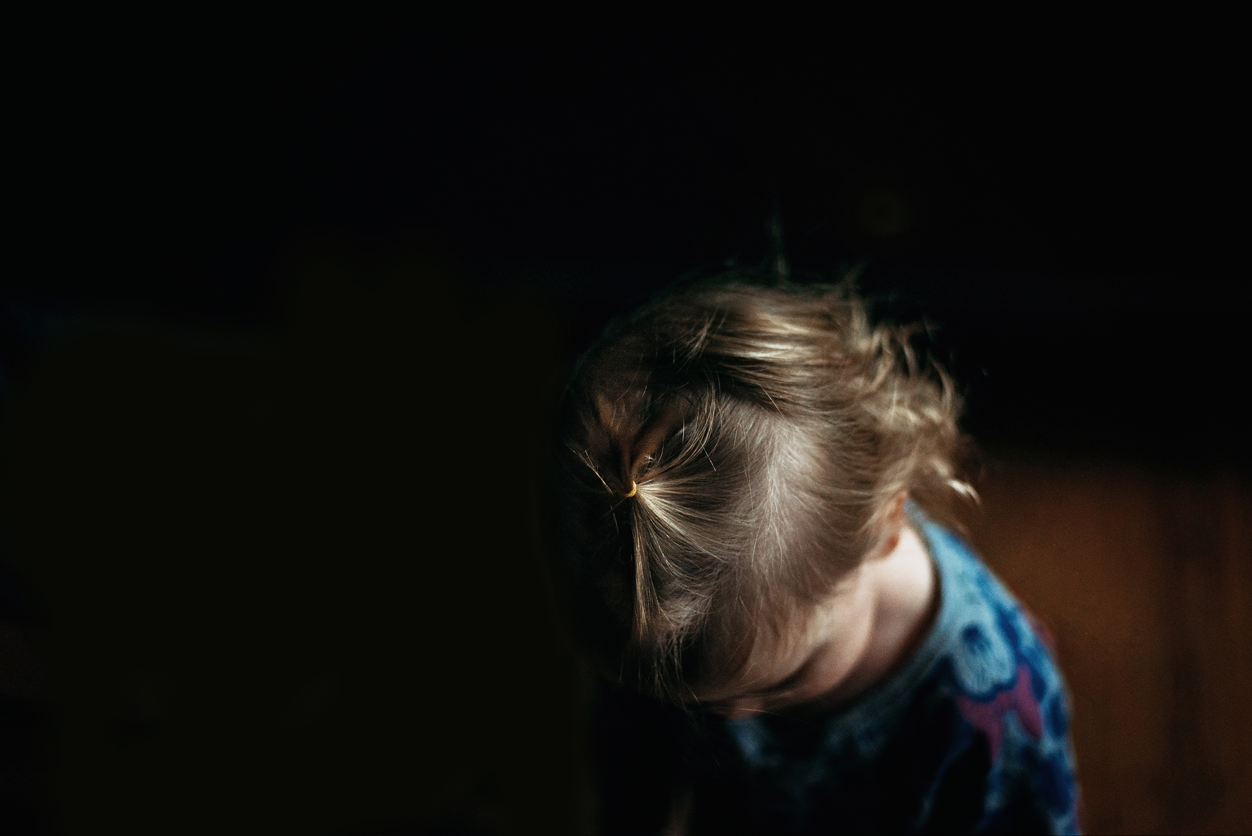 Soft focus, cropped for wispy hair details