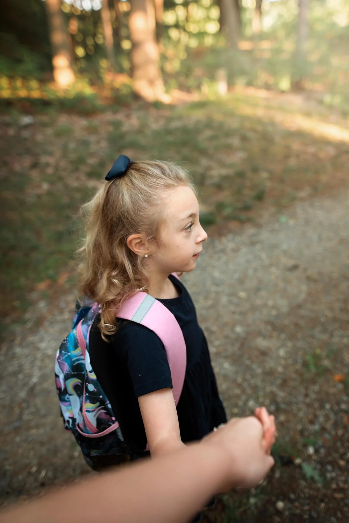 7:51 am… Walking Charlotte to the bus. 24mm, ISO 400, f 2.2, 1/250s