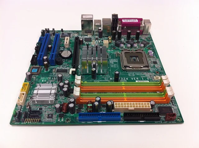 Typical modern computer main system board. Note all the standardized slots and connectors for all the add-on boards and system cables. Photo courtesy of pixabay.com.